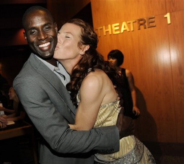 Tanna Frederick Giving Leading Man Lanre Idewu a Kiss at Premiere of Irene in Time