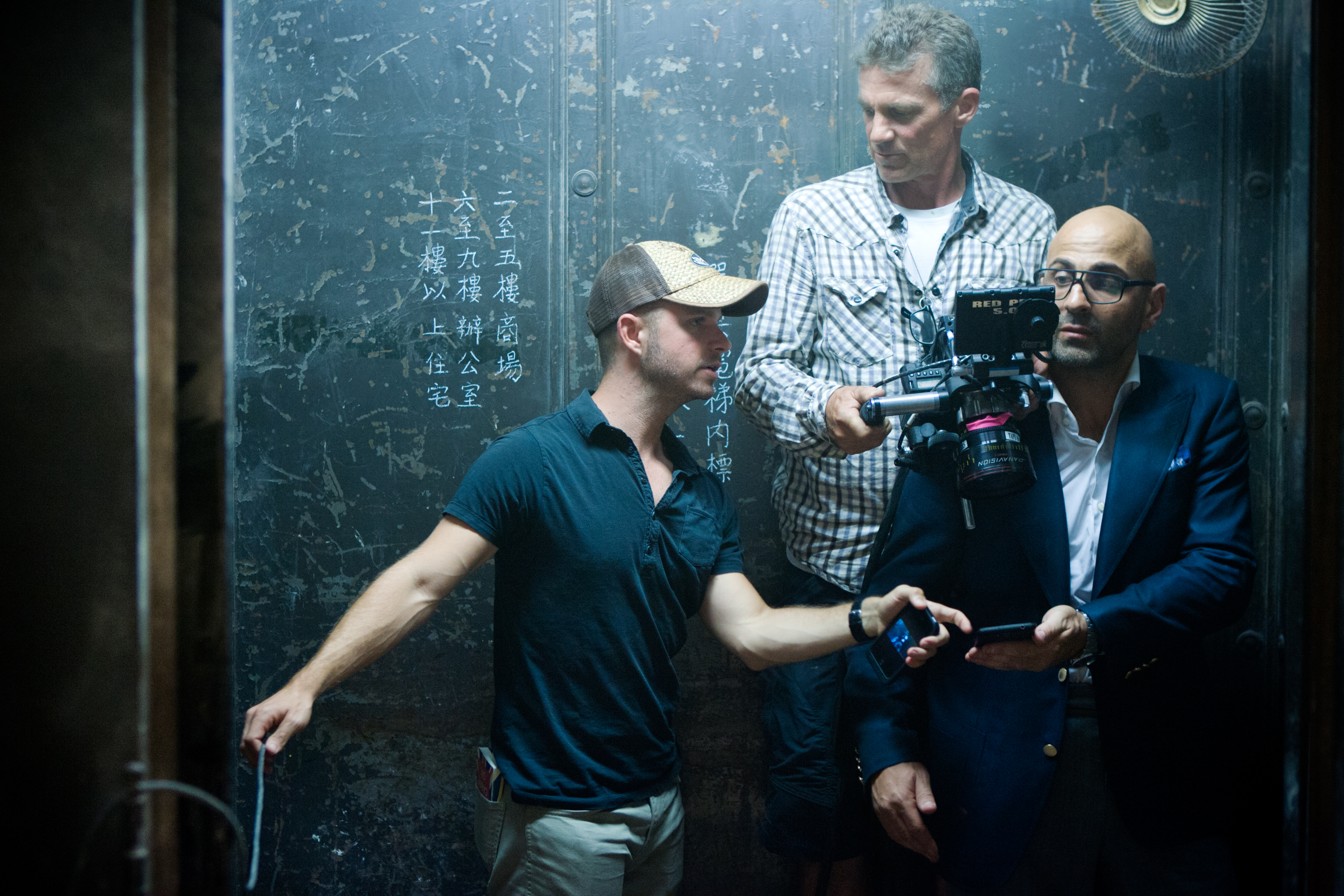 Mark Freiburer on set of TRANSFORMERS: AGE OF EXTINCTION with camera operator John Skotchdopole and stuntman Theo Kypri