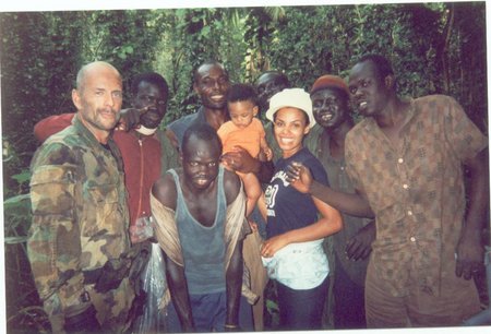 Awino Gam and Bruce Willis on set photo.