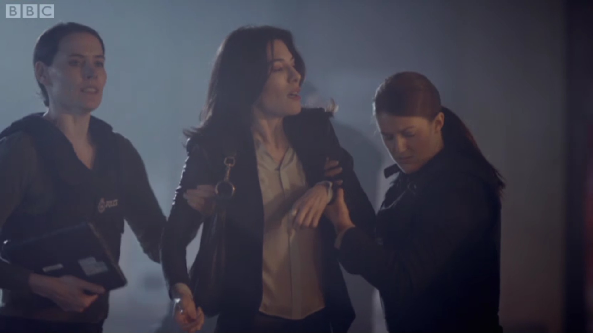 Scene from the final episode of the TV series Hustle with Jaime Murray.