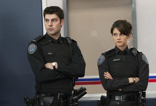 Still of Missy Peregrym and Travis Milne in Rookie Blue (2010)