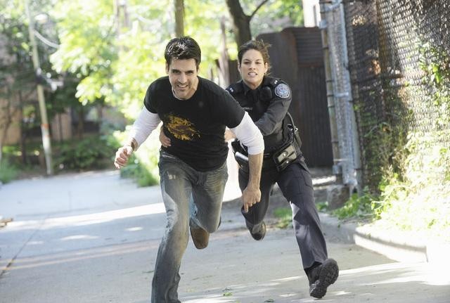 Still of Ben Bass and Missy Peregrym in Rookie Blue (2010)