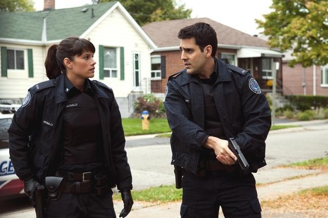 Still of Ben Bass and Missy Peregrym in Rookie Blue (2010)