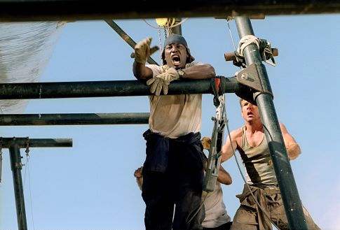 AJ (Tyrese Gibson, left) and Towns (Dennis Quaid) have strong reactions to a problem in the building of the Phoenix.