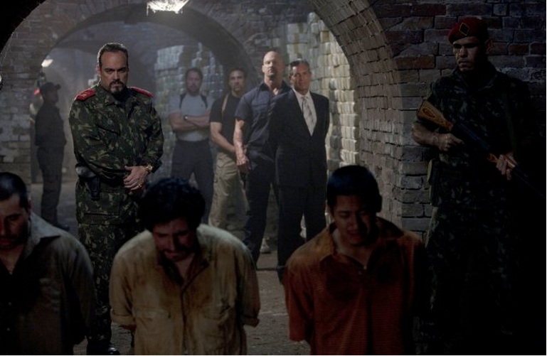 Still from the movie, 'The Expendables', with David Zayas, Eric Roberts, Steve Austin, the Nogueira Twins and the wonderful stuntmen on each side of me...