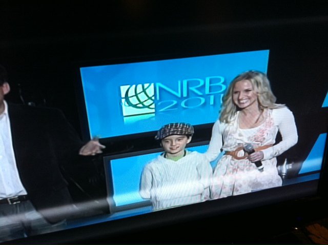 Jenn Gotzon introduces Doonby at NRB with Mark Joseph and his daughter