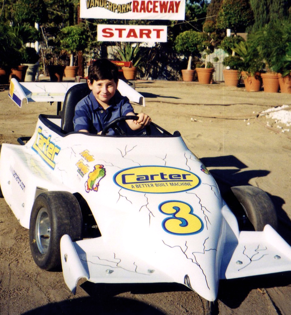 All afternoon, I was burning to ride this race car around the mini track set on the movie 