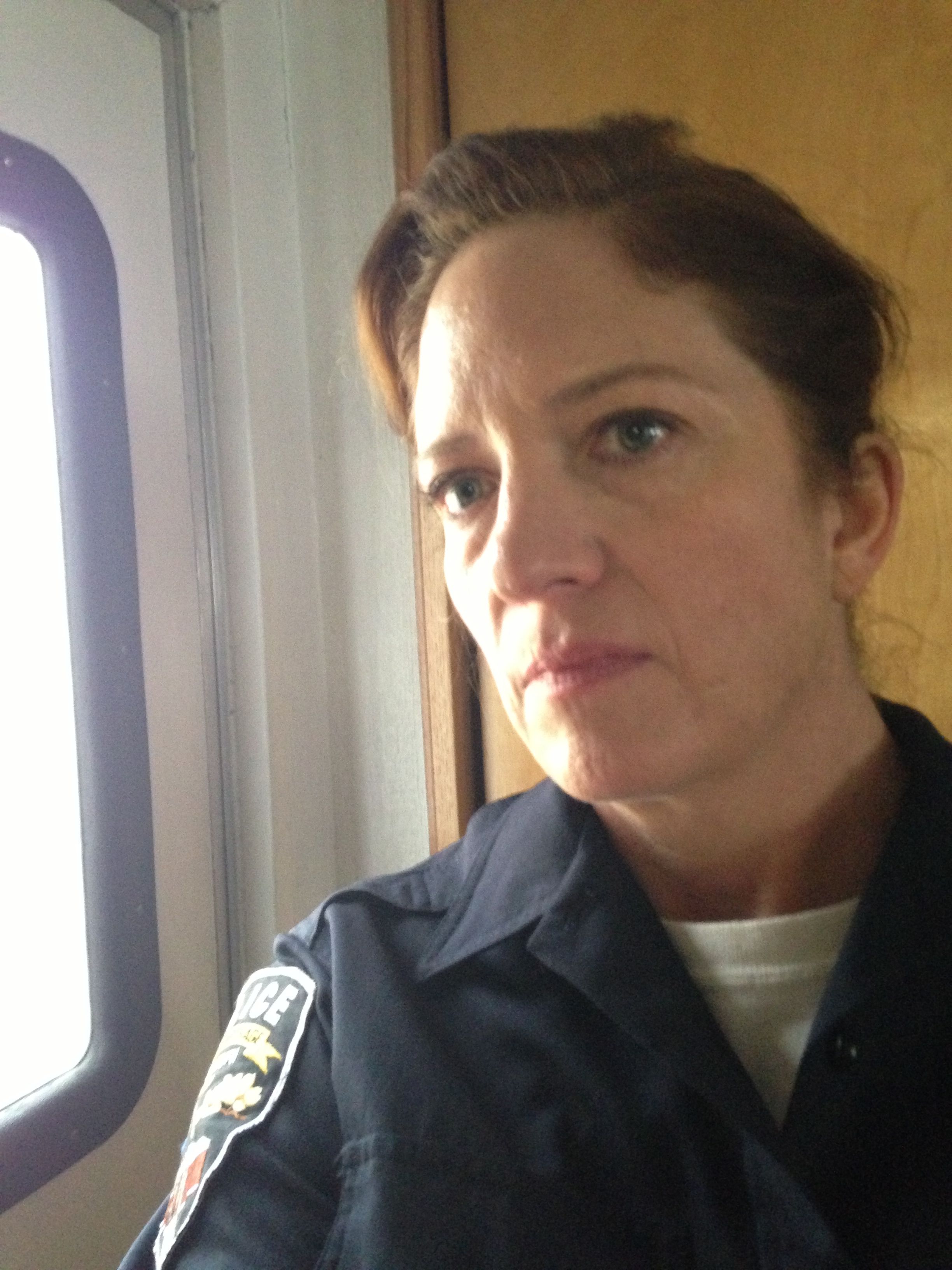 Julia as the female officer in 