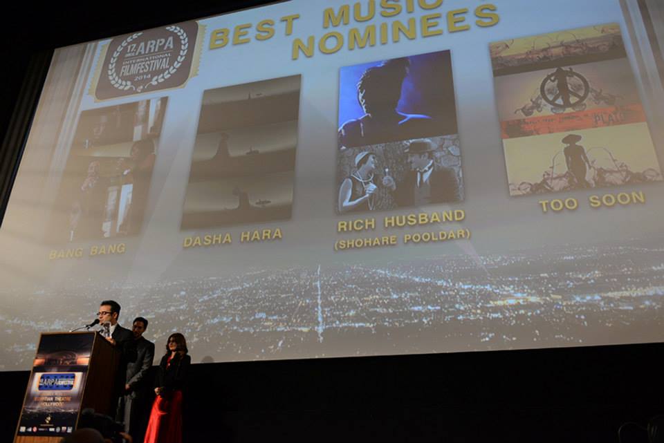 Accepting an award at the Arpa International Film Festival in Los Angeles.