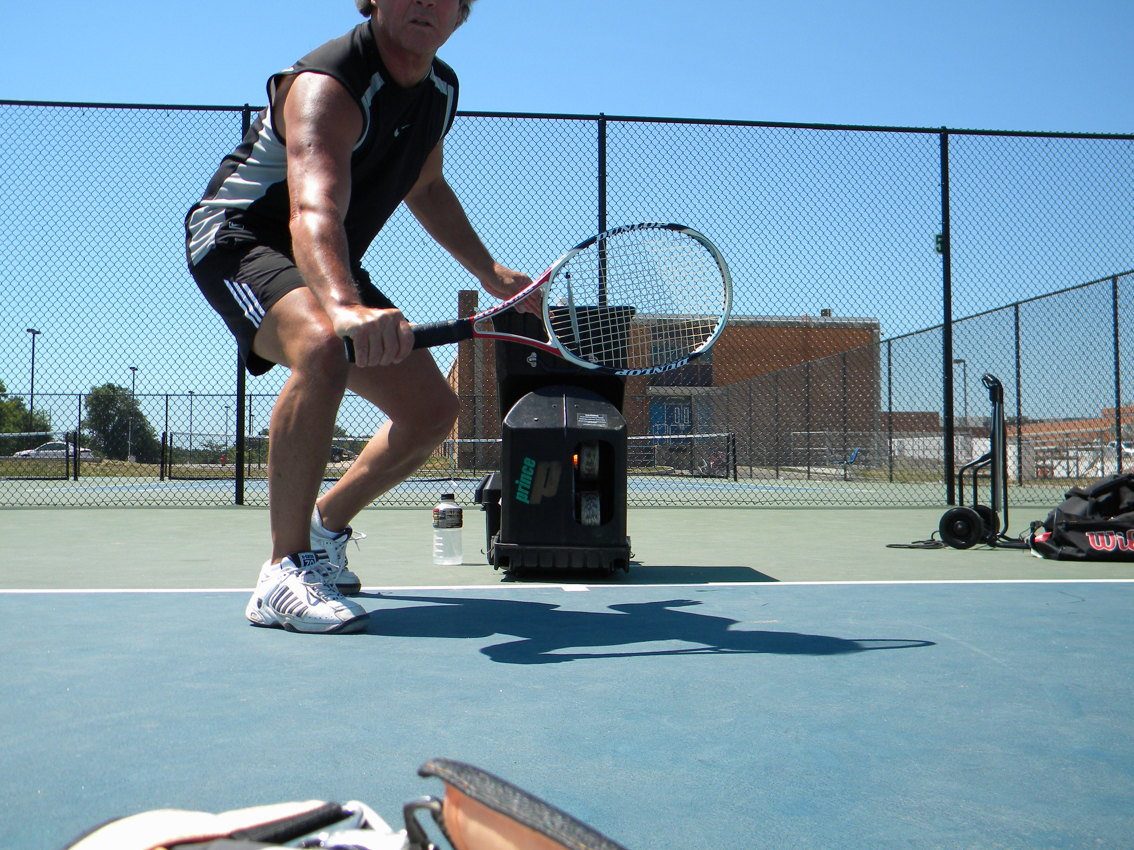 USPTA Tennis Pro/Instructor, working out