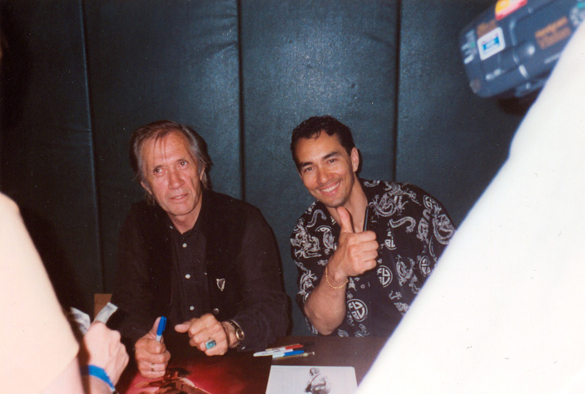 David Carradine and Vincent signing autographs for fans at the World Martial Arts Hall of Fame Event.