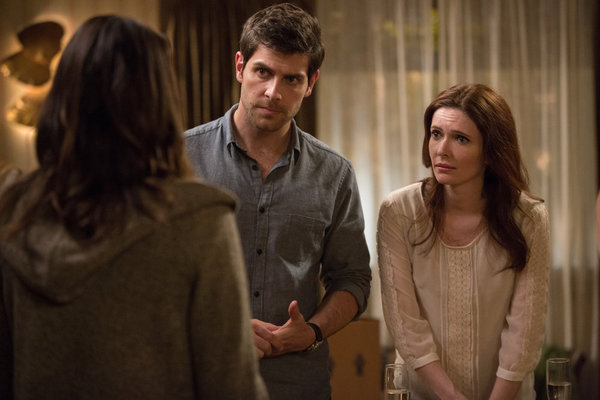 Still of Bitsie Tulloch and David Giuntoli in Grimm (2011)