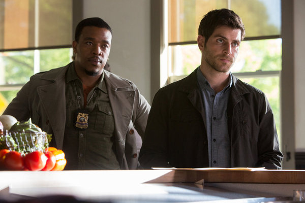 Still of Russell Hornsby and David Giuntoli in Grimm (2011)