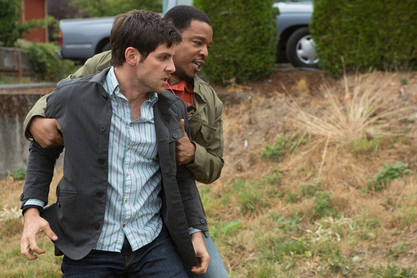 Still of Russell Hornsby and David Giuntoli in Grimm (2011)