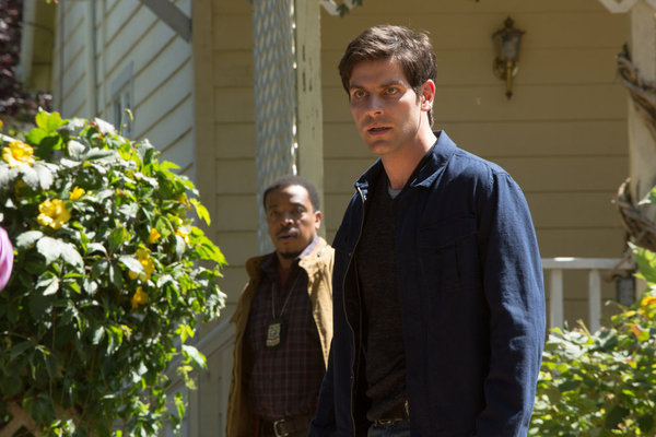 Still of Russell Hornsby and David Giuntoli in Grimm (2011)