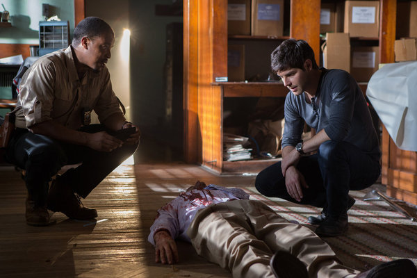 Still of Russell Hornsby and David Giuntoli in Grimm (2011)