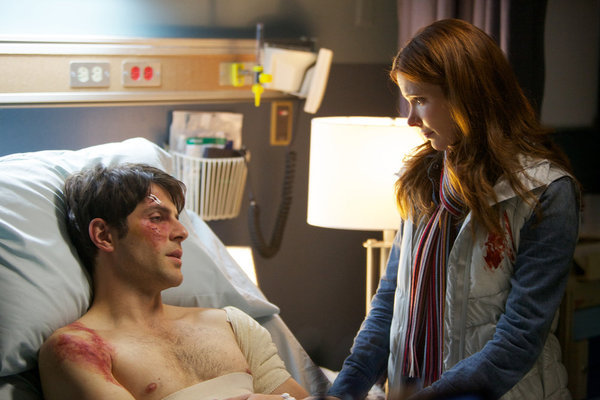 Still of Bitsie Tulloch and David Giuntoli in Grimm (2011)