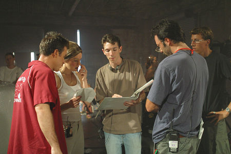 Director Philip Zlotorynski with cast members on the set of 