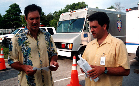 Patrick Warburton and Director Paul Sullivan discuss an upcoming scene.