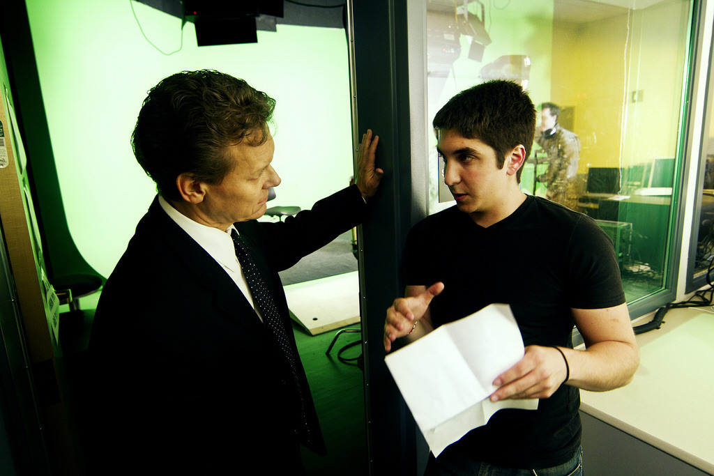 Taking direction from Rick Peters on the set of 