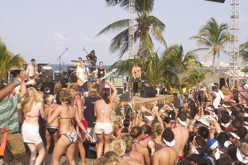 (left side of frame, left to right) Dave (green shirt), Heidi, Laura, Nicole, Roxanne, Casey, and Brittany party to the sounds of Hot Action Cop.