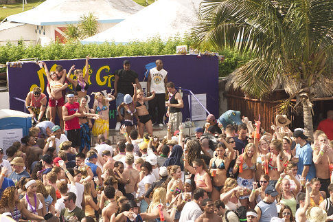 (on stage, left to right, top to bottom) Jeremy, Roxanne, Alan, Sarah, Jorell, Paul, Matt, Dave, Amber, Heidi, Sky, Nicole, and Fletch all dance it up at a Mardi Gras theme party.