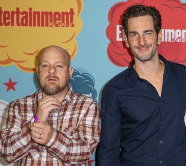 AN DIEGO, CA - JULY 20: (L-R) Director David Slade and actor Aaron Abrams arrive at Entertainment Weekly's annual Comic-Con celebration at Float at Hard Rock Hotel San Diego on July 20, 2013 in San Diego, California.