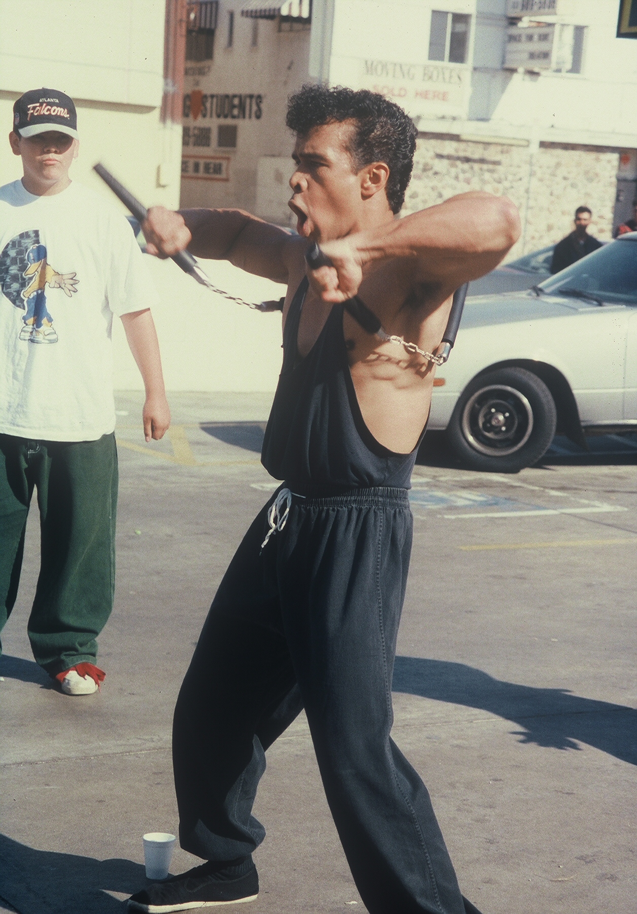 Stan Derain as MC Kung Fu using the double nunchakus in the feature film 