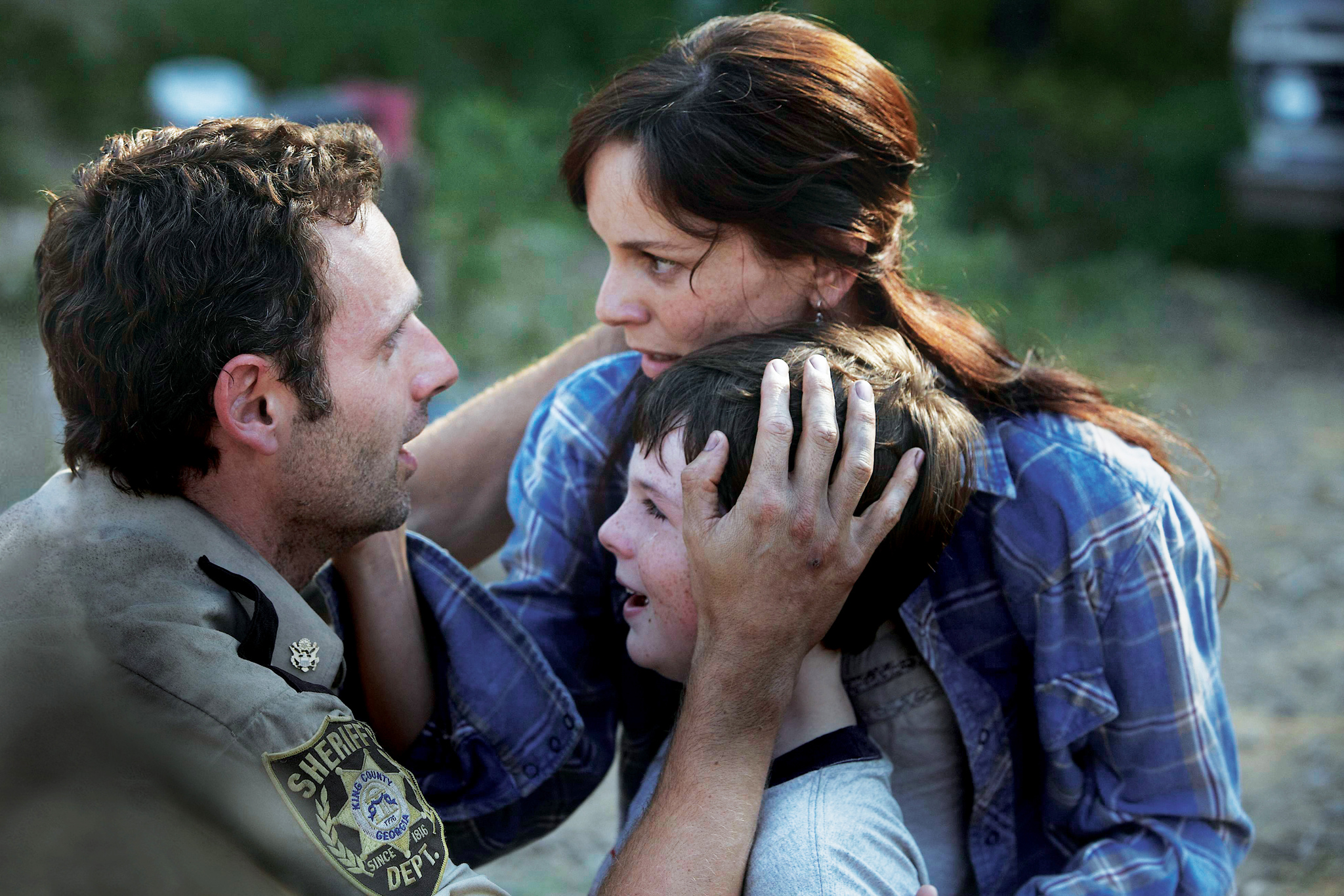 Still of Andrew Lincoln, Sarah Wayne Callies and Chandler Riggs in Vaiksciojantys negyveliai (2010)