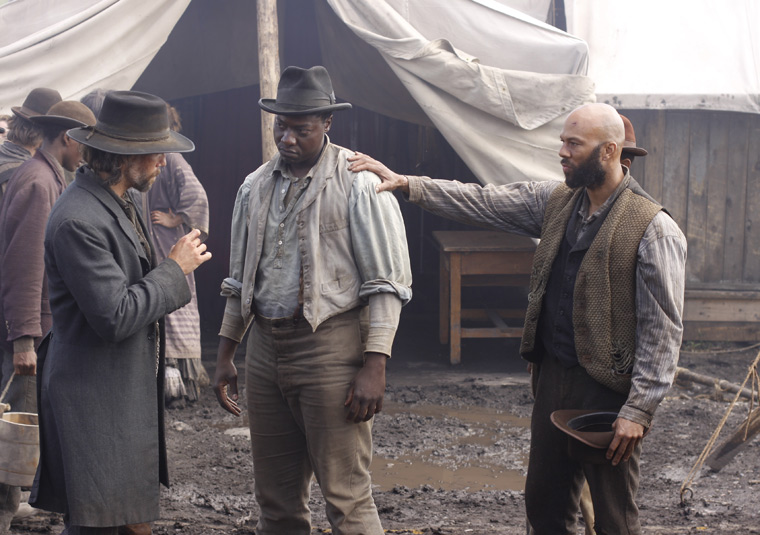 HELL ON WHEELS, SEASON 1: Cullen Bohannon (Anson Mount), Psalms (Dohn Norwood), & Elam Ferguson (Common) 2011