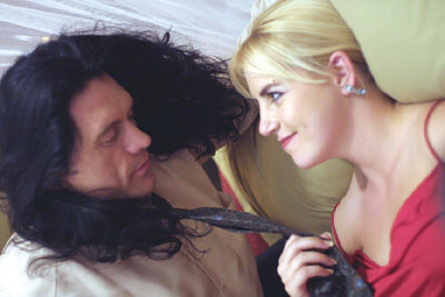 Tommy Wiseau and Juliette Danielle in The Room (2003)