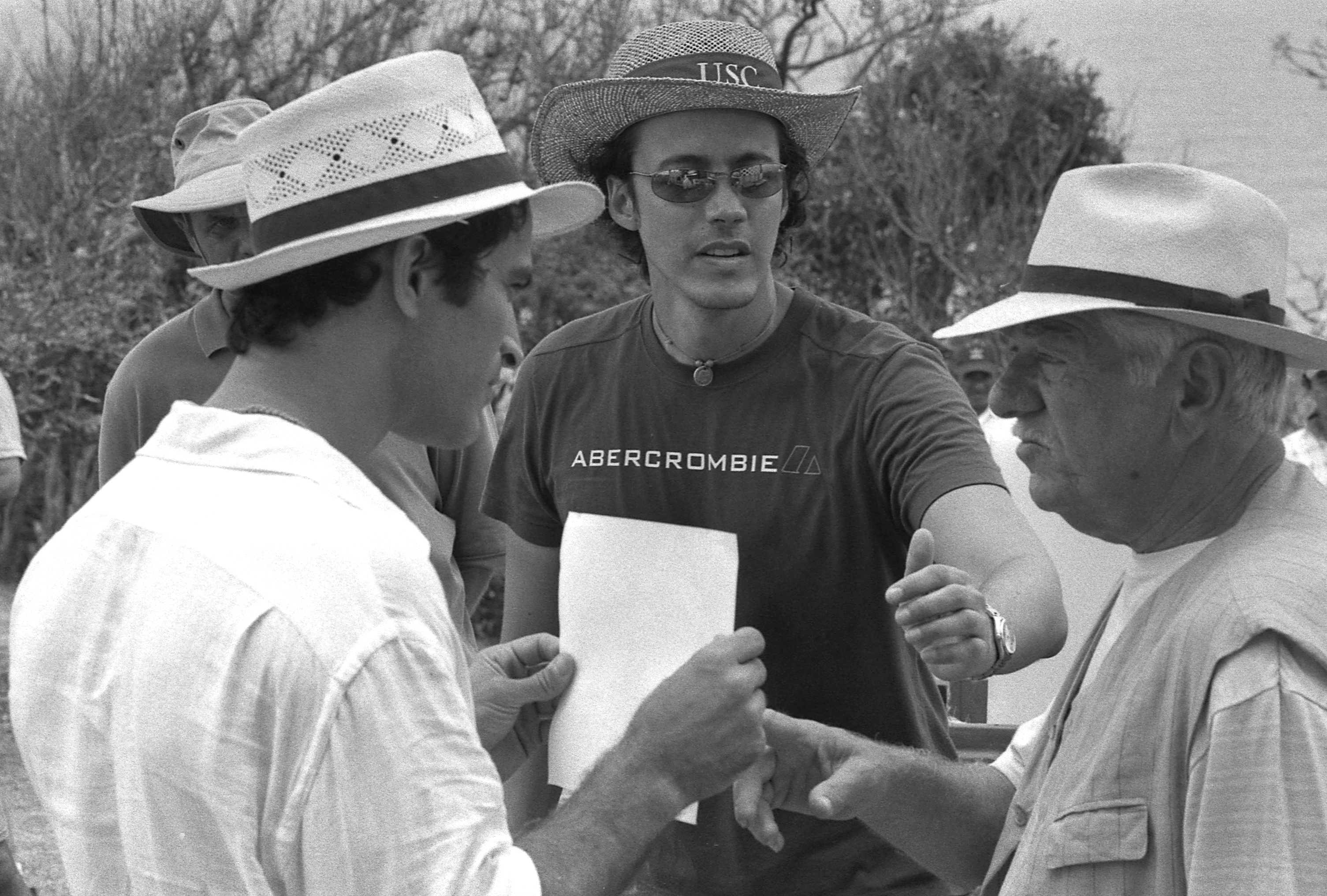 Director Jose Bojorquez (center) gives direction to actors Johnathon Schaech (far left) and Seymour Cassel (far right), in Success Films' SEA OF DREAMS. Location: Punta Roca Partida, Veracruz, México.