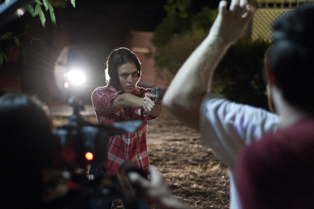 Still of Trieste Kelly Dunn on the set of LOVES HER GUN.