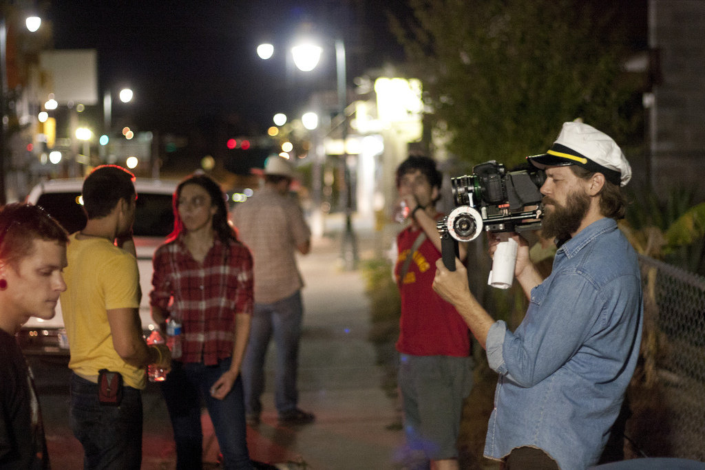 Director Geoff Marslett watches playbabck on the set of LOVES HER GUN.