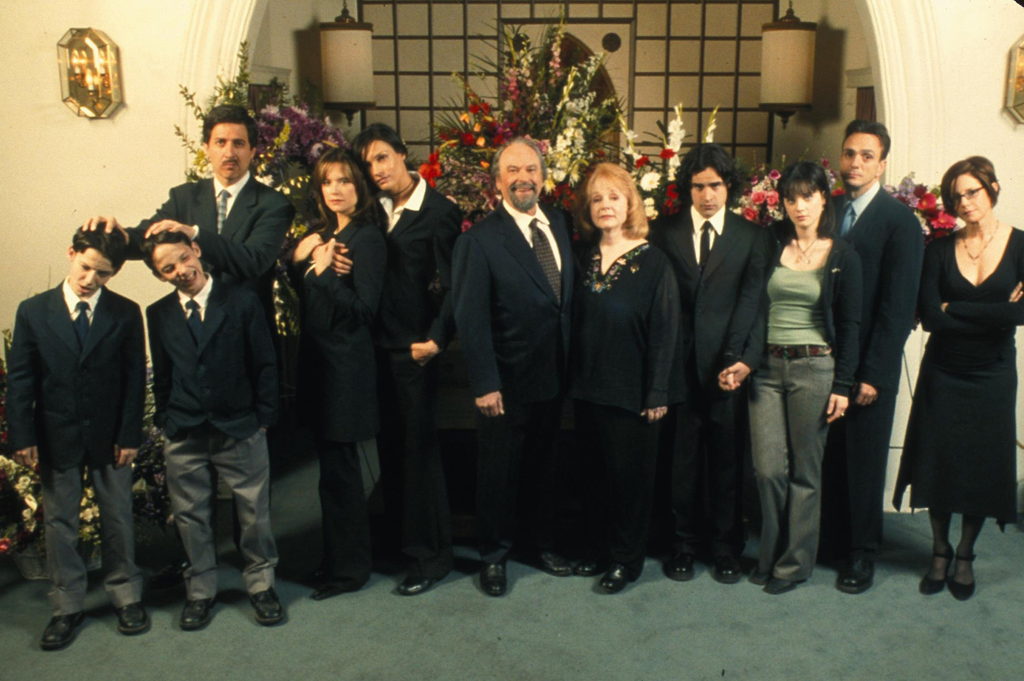 Still of Hank Azaria, Famke Janssen, Kelly Preston, Debra Winger, Piper Laurie, Rip Torn, Ray Romano, Jesse Bradford, Zooey Deschanel, Keith Garcia and Curtis Garcia in Eulogy (2004)