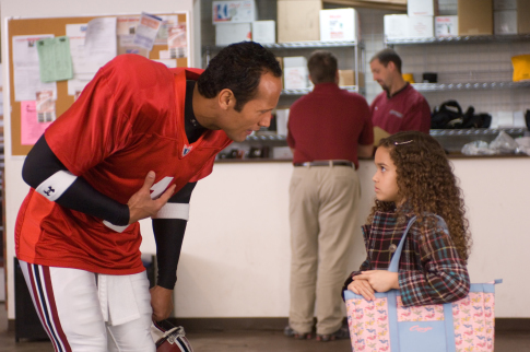 Still of Dwayne Johnson and Madison Pettis in The Game Plan (2007)