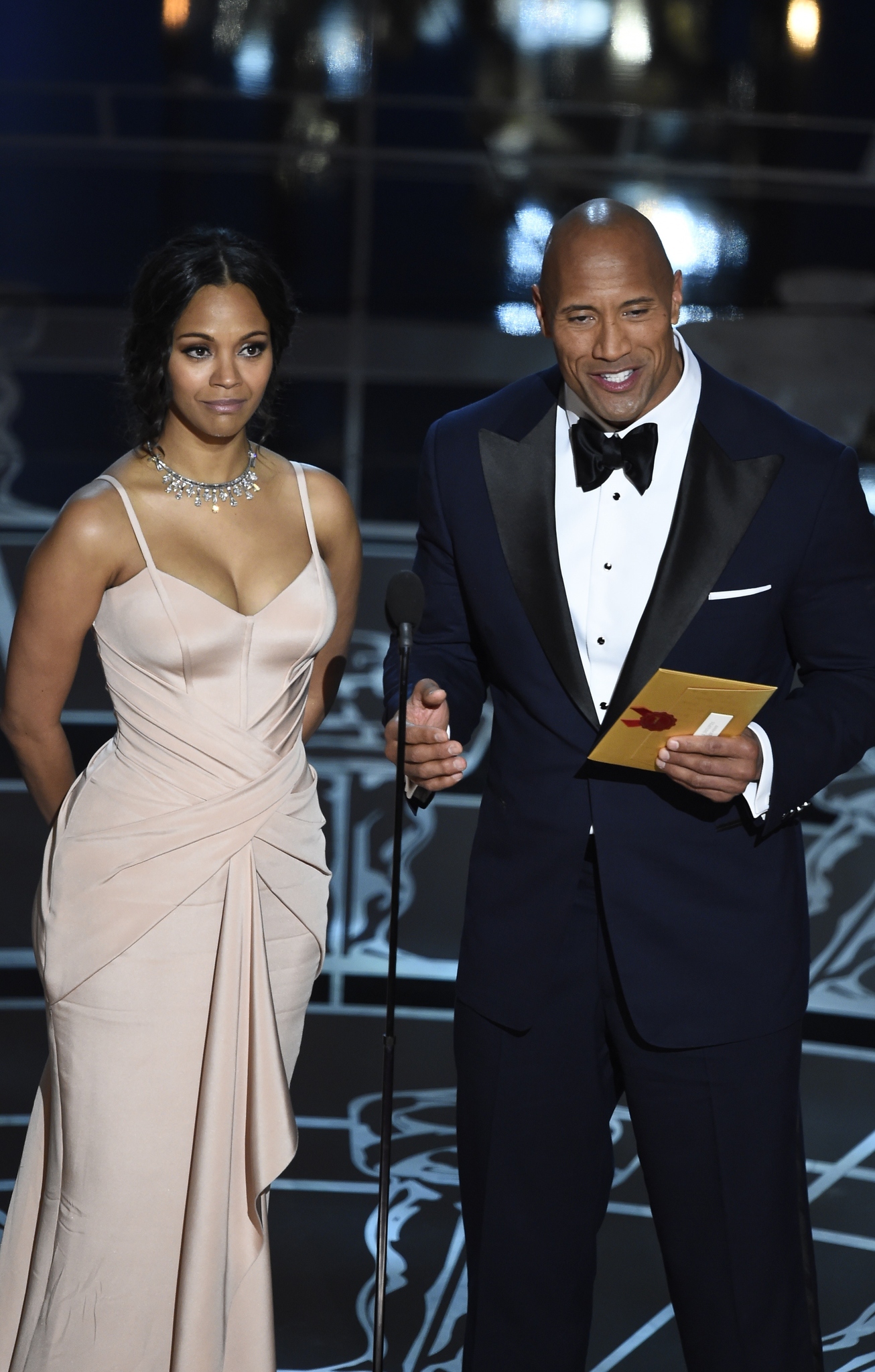 Dwayne Johnson and Zoe Saldana at event of The Oscars (2015)