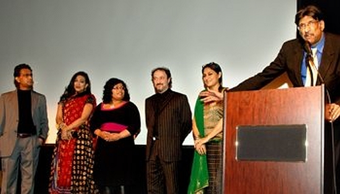 The headlining cast, director,and publicist for Piyalir Password at movie premiere