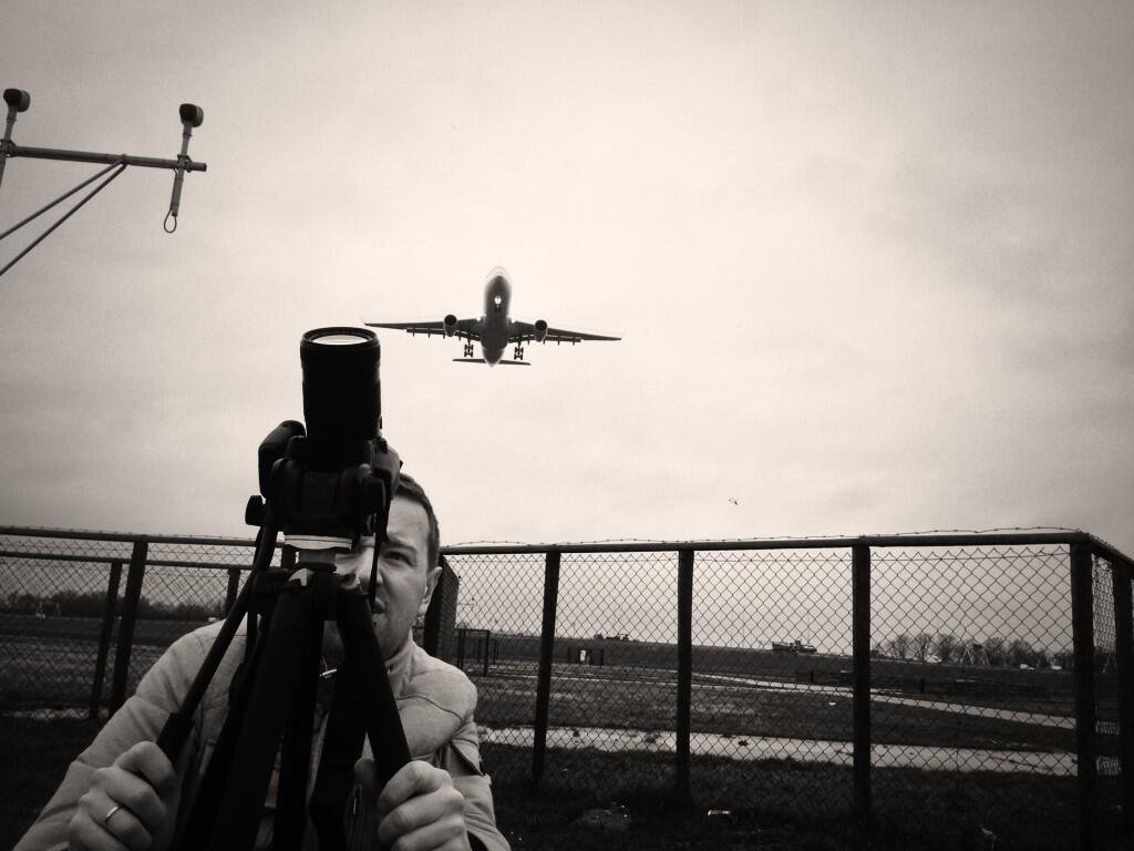 Shooting plates of passing airplanes.