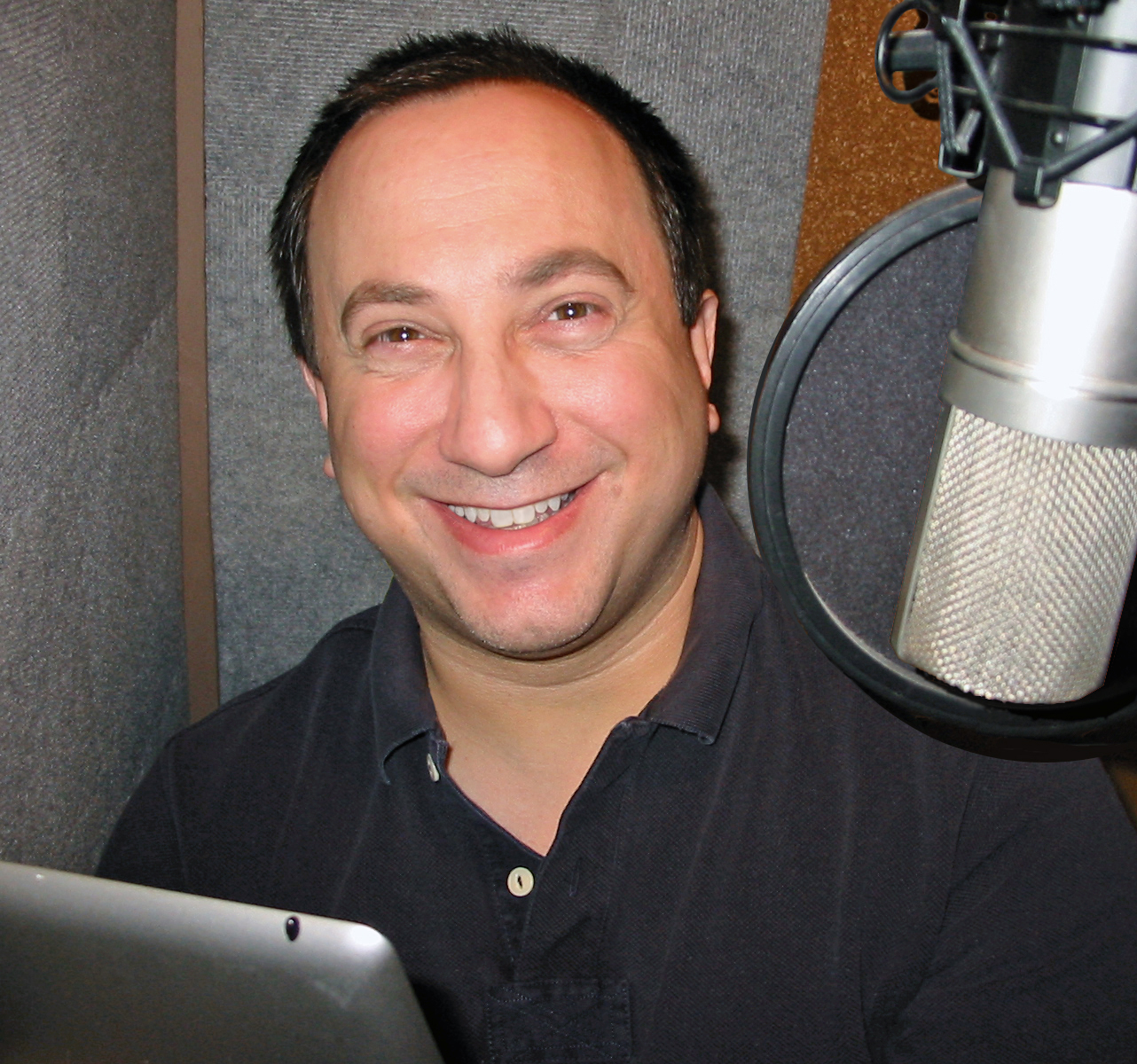 Mark Weitzman in home voice recording booth