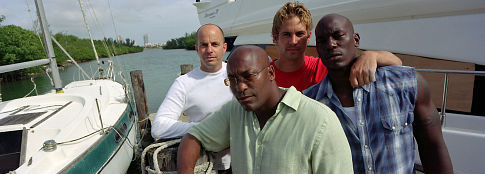 John Singleton, Neal H. Moritz, Tyrese Gibson and Paul Walker in Greiti ir Isiute 2 (2003)