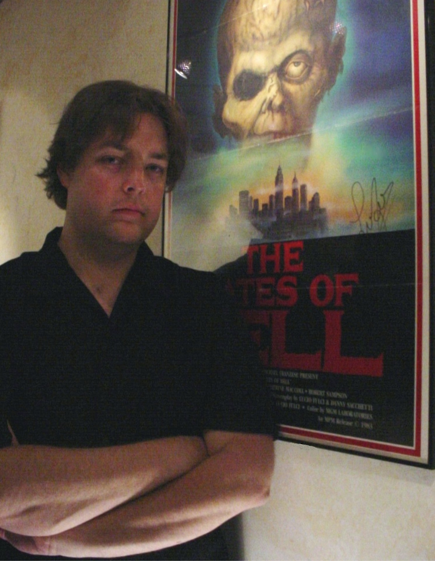 Mike Baronas with his prized GATES OF HELL one-sheet signed by maestro Lucio Fulci