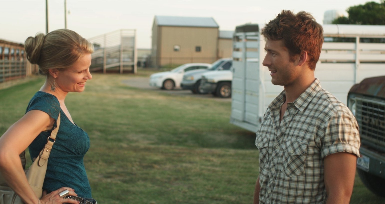 Still of Joelle Carter and Glen Powell in Red Wing (2013)