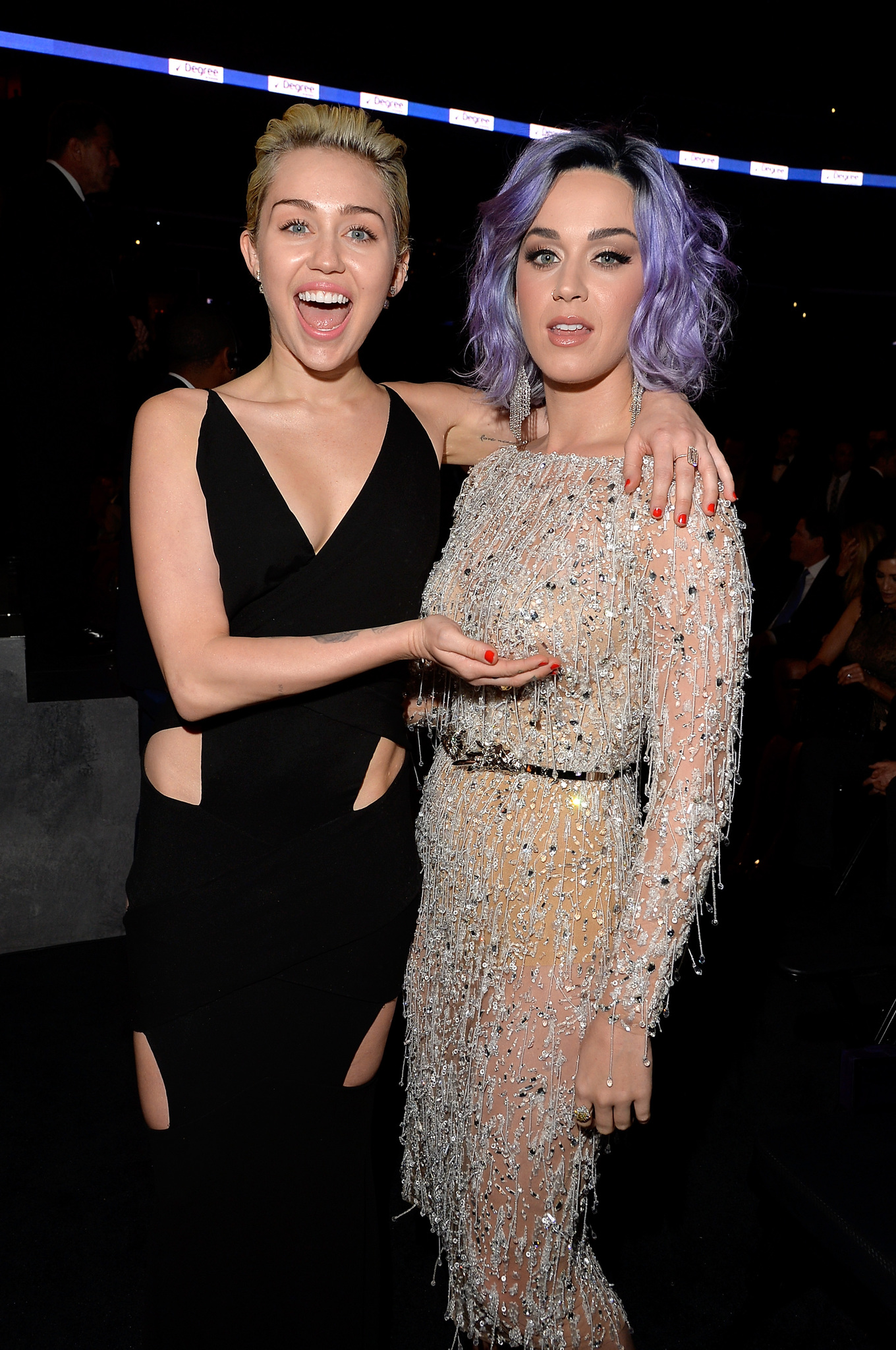 Miley Cyrus and Katy Perry at event of The 57th Annual Grammy Awards (2015)
