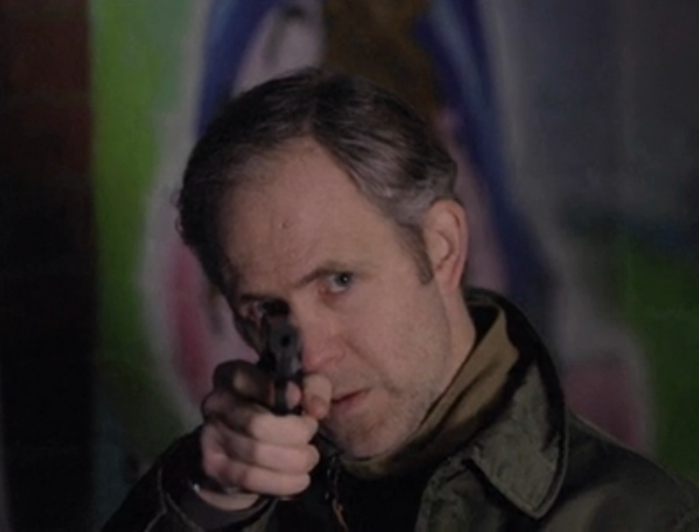 'Mike' demonstrating the use of a 9mm Browning HP Pistol in the short film Forgivness.