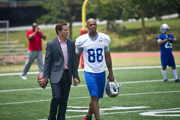Still of Scott Cohen and Mehcad Brooks in Necessary Roughness (2011)