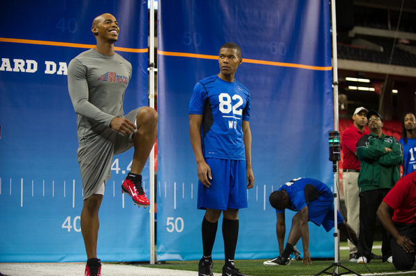 Still of Mehcad Brooks and Gaius Charles in Necessary Roughness (2011)