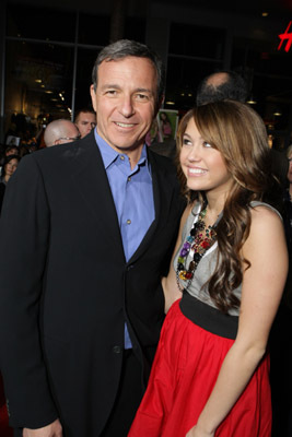 Miley Cyrus and Robert A. Iger at event of Boltas (2008)