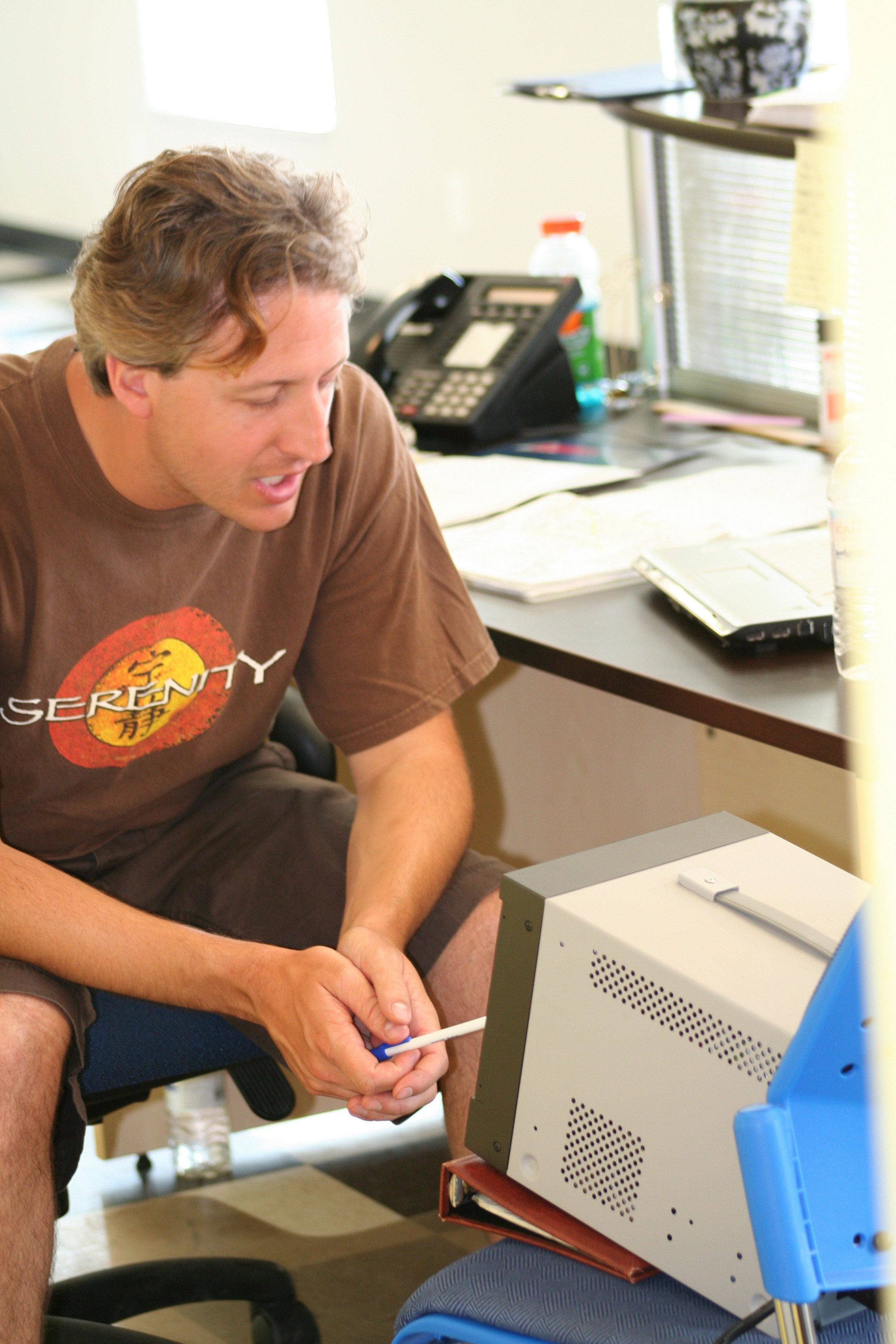 Director Blake Van de Graaf watching the performances behind the monitor.