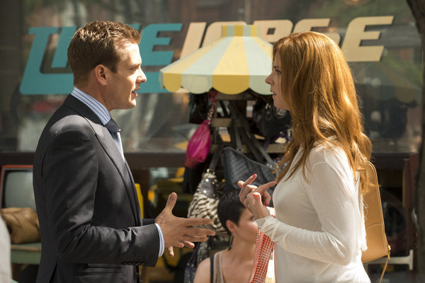 Still of Gabriel Macht and Sarah Rafferty in Suits (2011)